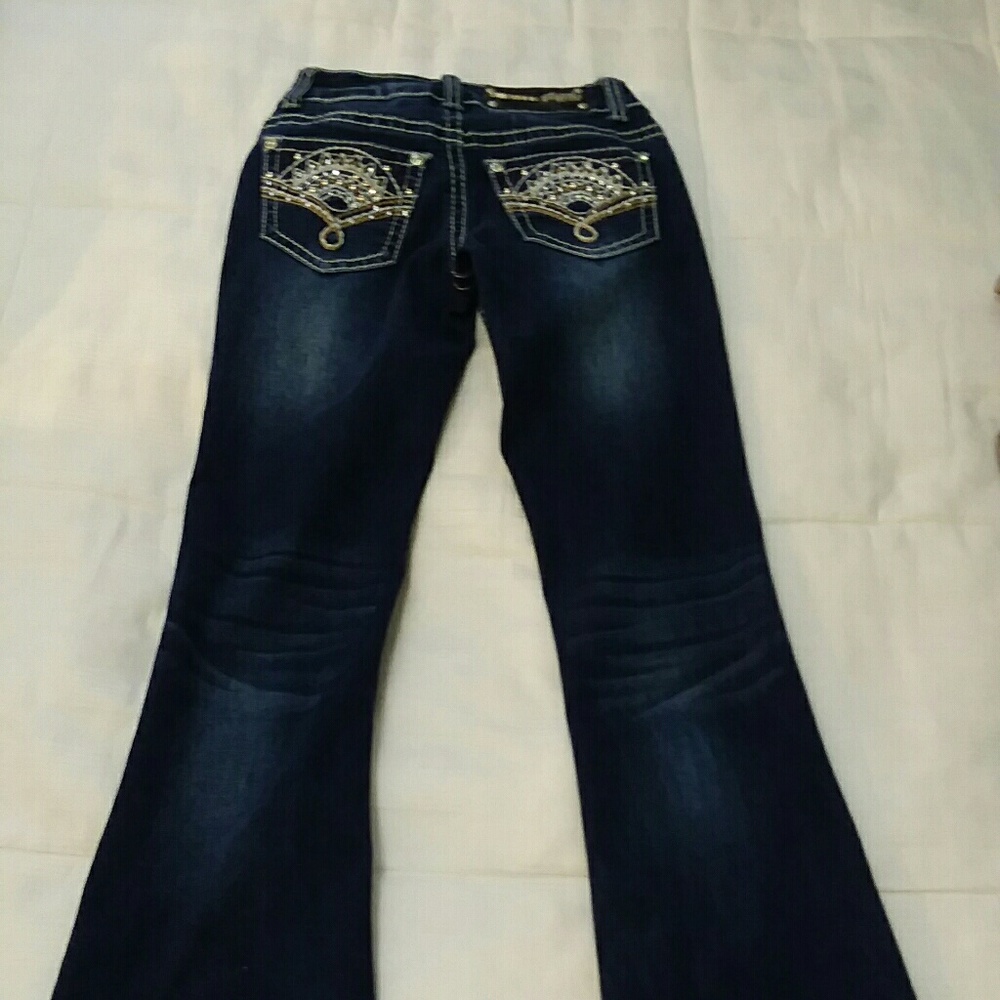 Girls Rodeo Girl bootcut jeans with bling pockets.